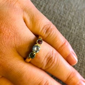 Womens three stone yellow gold ring.